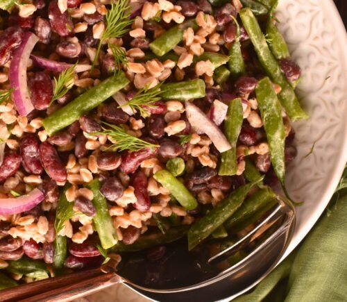 Lemony Farro And Bean Salad with kidney, black, and green beans with a Dijon dressing
