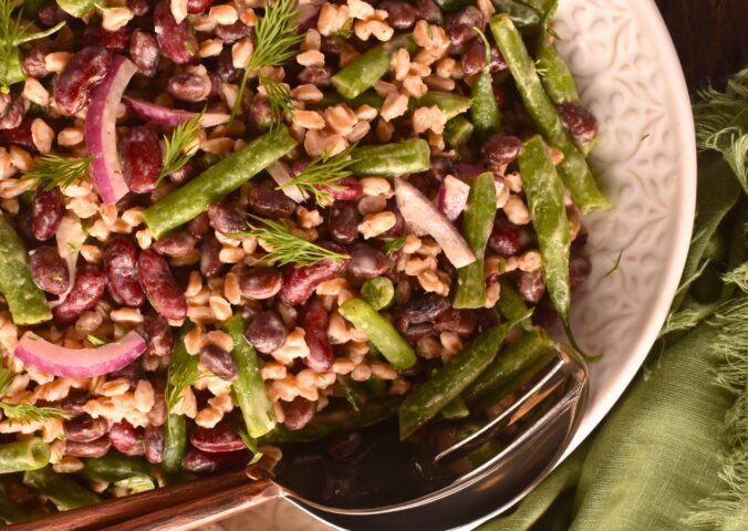 Lemony Farro And Bean Salad with kidney, black, and green beans with a Dijon dressing