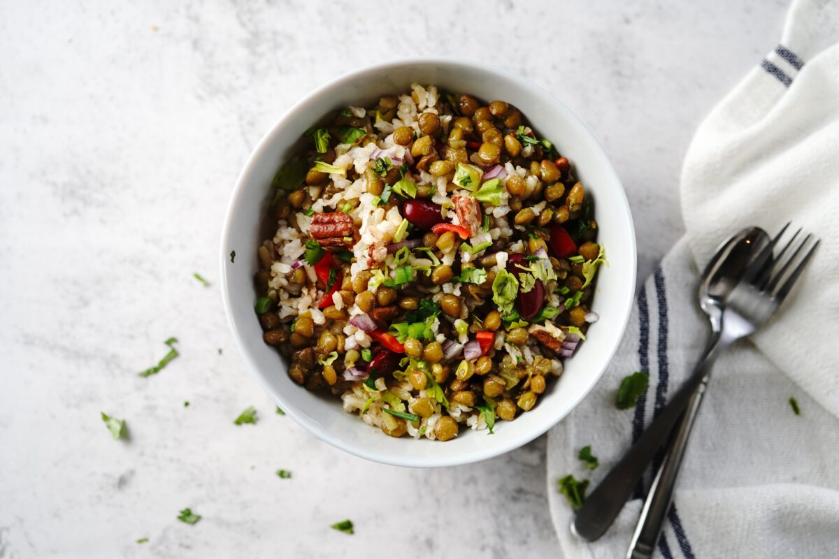 Photo shows a homemade salad or rice bowl featuring healthy grains and legumes. A new study has examined what the children of centenarians eat.