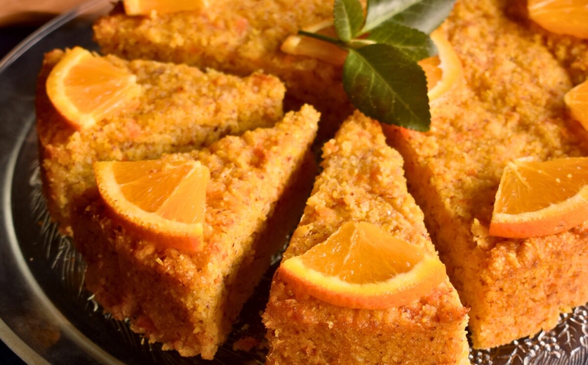Orange-Ginger Polenta Cake with applesauce, maple syrup, vegan whipped cream and almond flour