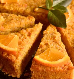 Orange-Ginger Polenta Cake with applesauce, maple syrup, vegan whipped cream and almond flour