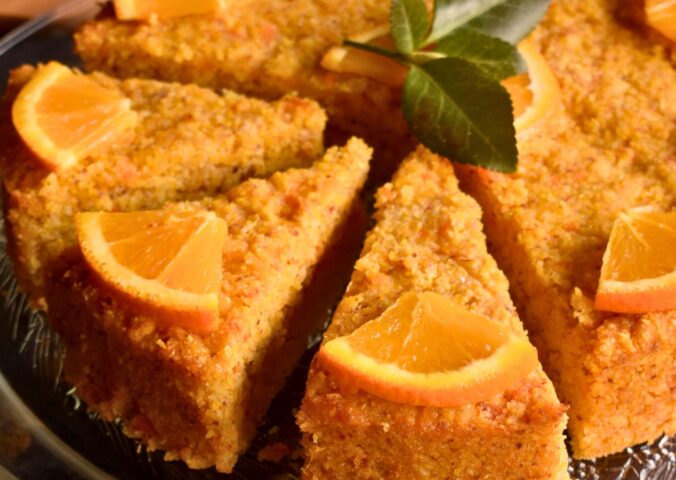 Orange-Ginger Polenta Cake with applesauce, maple syrup, vegan whipped cream and almond flour