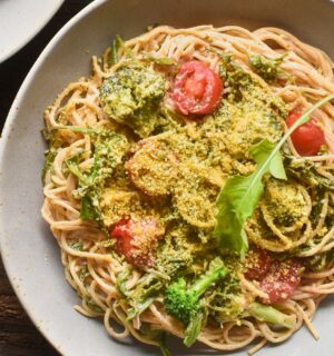Pasta With Arugula In A Creamy Lemon Sauce with cashews, whole-grain pasta, broccoli, tomato, and vegan parm