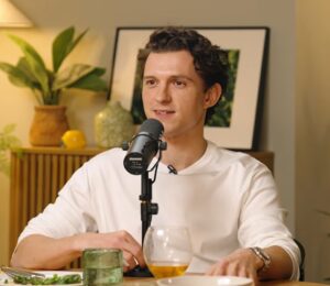 Photo shows 'Spider-Man: Brand New Day' actor Tom Holland during a recent appearance on the Dish' podcast, where he described cooking "veggie dishes" for Zendaya, who "doesn't eat meat," from his brother Sam's new cookbook