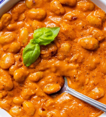 A close-up of beans alla vodka, a plant-based and high protein take on penne alla vodka for 7 Creamy Vegan Tomato Recipes