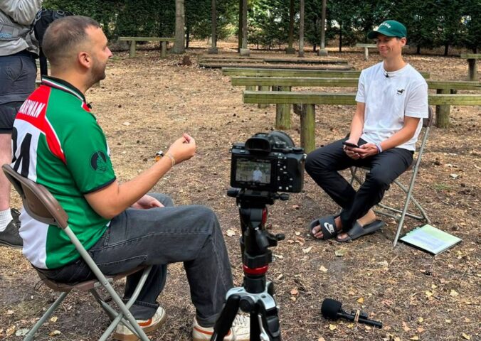 Photo shows Plant Based News founder Klaus Mitchell and leader of the Green Party Zack Polanski during a recent interview at Vegan Camp Out, where Polanski once again said he would end factory farming if he became Prime Minister