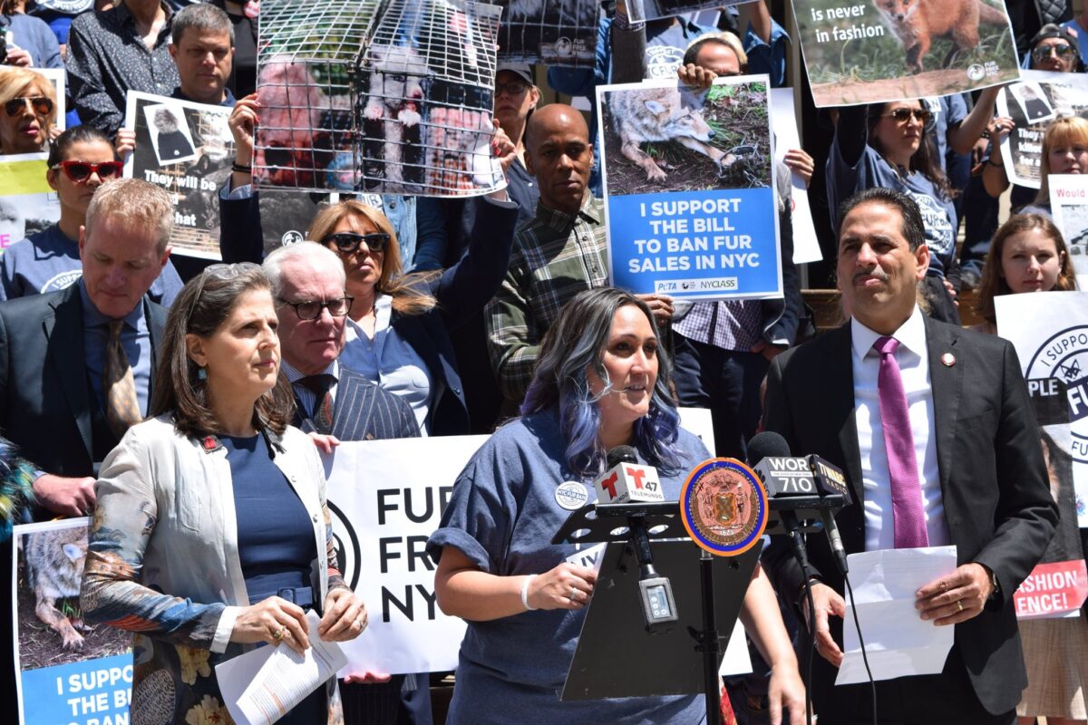 Photo shows Allie Taylor, who was just appointed the new director of the Mayor’s Office of Animal Welfare in New York City (NYC), giving a speech at an anti-fur demonstration