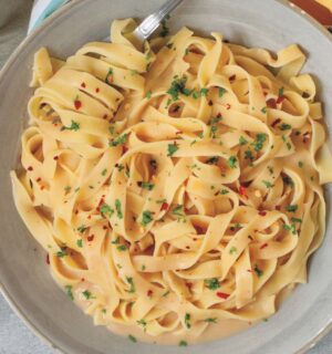 Creamy Cannellini Fettuccine Alfredo with nutritional yeast, onion, and lemon