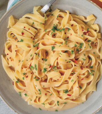 Creamy Cannellini Fettuccine Alfredo with nutritional yeast, onion, and lemon