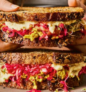 gut-loving sourdough sandwich with pink sauerkraut, hummus, and tofu