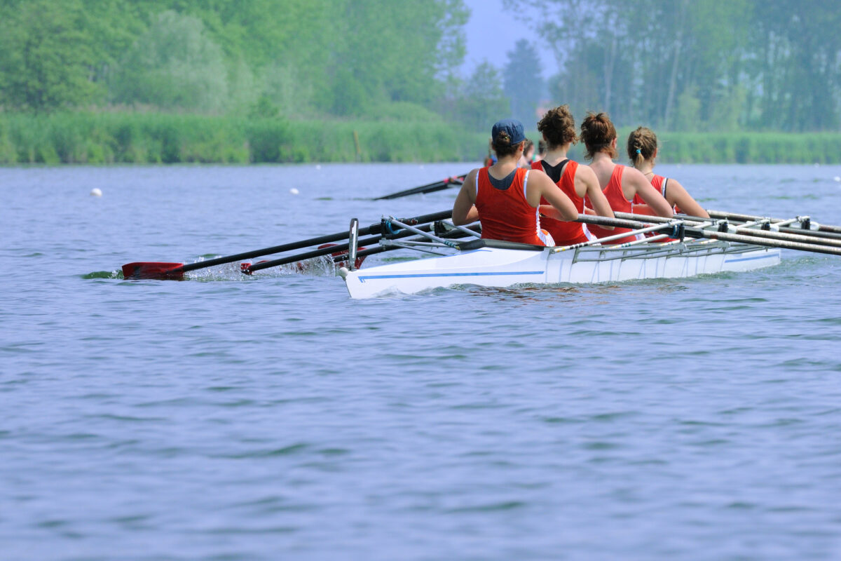 Photo shows four women rowing. Imogen Grant, the Olympic gold medal winner, is training for LA 2028 on a vegan diet