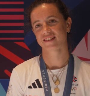 Photo shows Imogen Grant being interviewed by Lottery Good Causes with her Paris 2024 teammate Emily Craig. The pair won gold in the lightweight women's double sculls at the last Olympics. Imogen Grant is currently training for LA 2028 on a vegan diet