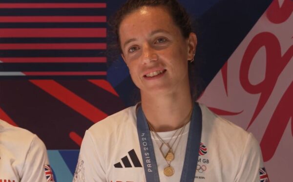 Photo shows Imogen Grant being interviewed by Lottery Good Causes with her Paris 2024 teammate Emily Craig. The pair won gold in the lightweight women's double sculls at the last Olympics. Imogen Grant is currently training for LA 2028 on a vegan diet