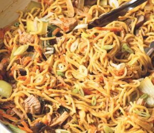 Jackfruit lo mein with chinese noodles, onion, garlic, young jackfruit, pepper, and mushroom