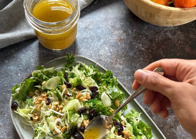 mandarin vinaigrette with olive oil, mandarin juice, apple cider vinegar, English mustard, maple syrup, garlic, and more