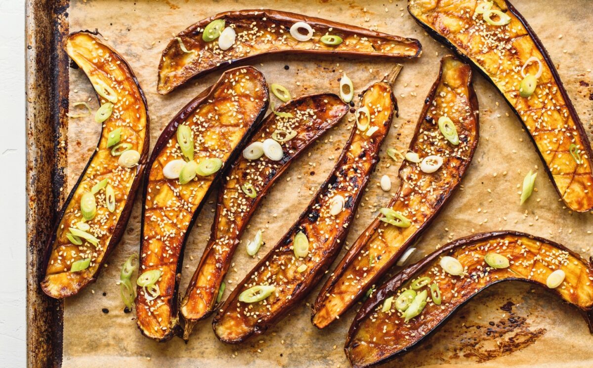 Miso Eggplant on a tray with sesame and scallions