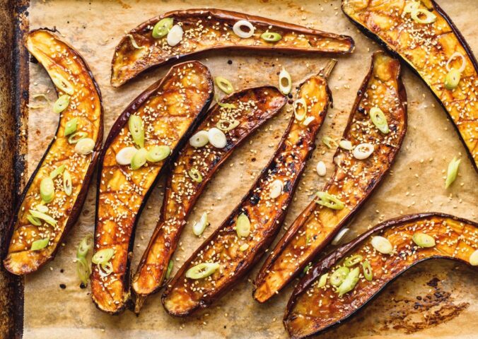 Miso Eggplant on a tray with sesame and scallions
