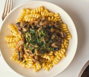 Modern Portobello Stroganoff with curly noodles