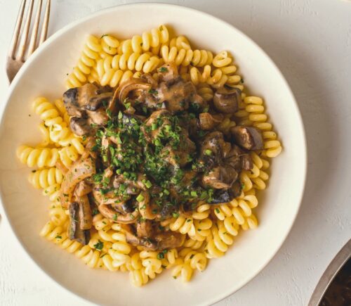 Modern Portobello Stroganoff with curly noodles