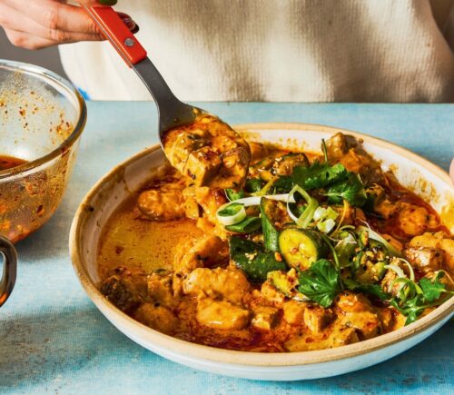 Tahini Beans With Crushed Cucumbers with tofu, chili crisp, and butter beans