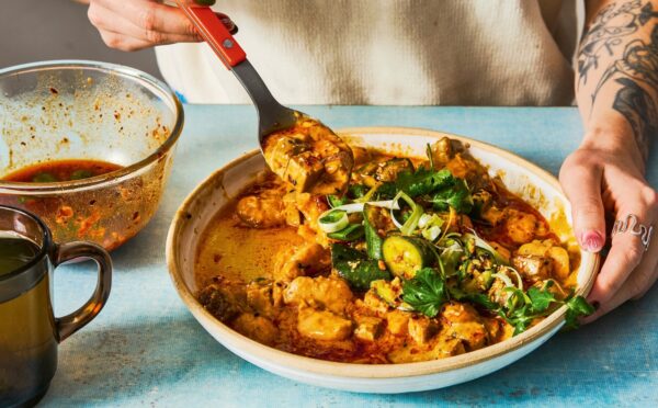 Tahini Beans With Crushed Cucumbers with tofu, chili crisp, and butter beans