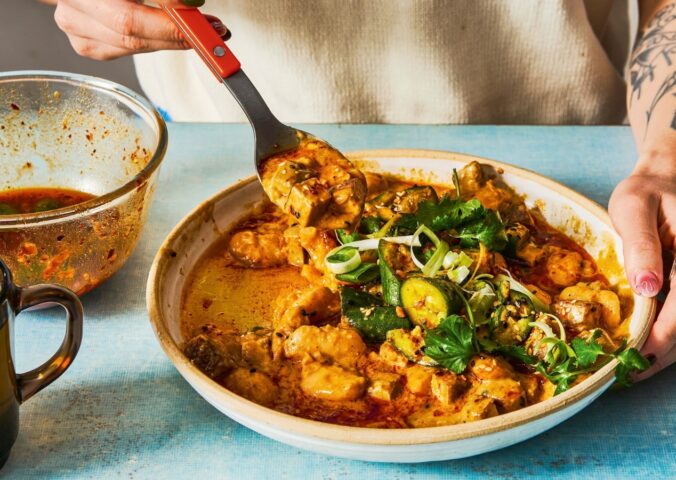 Tahini Beans With Crushed Cucumbers with tofu, chili crisp, and butter beans
