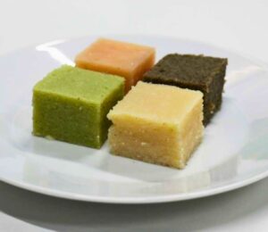 Photo shows four different colored cubes of plant-based protein made by the team of scientists using directional freezing. You can turn lentils into a texturized protein similar to fake meat with a simple method that has been around for hundreds of years