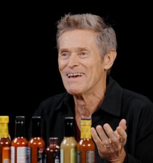 Photo shows Willem Dafoe during his recent appearance on the YouTube talk show 'Hot Ones,' where he chose to eat vegan chicken nuggets. The celebrated actor does not follow a vegan diet, but has said on multiple occasions that he doesn’t eat meat