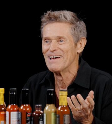 Photo shows Willem Dafoe during his recent appearance on the YouTube talk show 'Hot Ones,' where he chose to eat vegan chicken nuggets. The celebrated actor does not follow a vegan diet, but has said on multiple occasions that he doesn’t eat meat