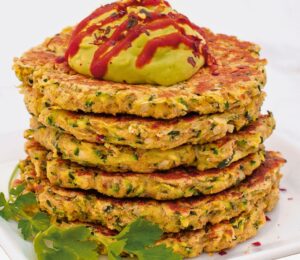 Quick And Crispy Zucchini Fritters With Avocado Crema