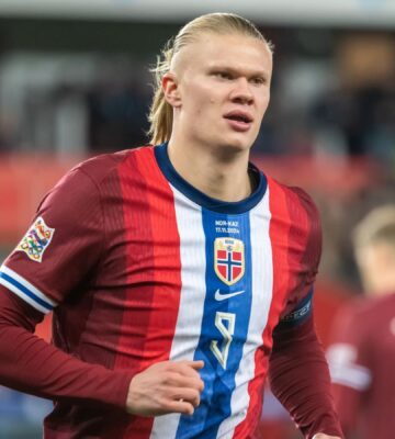 Photo shows professional footballer Erling Haaland, who has said that he "truly admires" cows and would like to retire to a farm one day