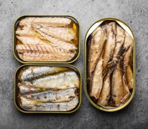 Photo shows three tins of fish. Tinned fish sold in UK supermarkets as "mackerel" may not actually contain any true mackerel