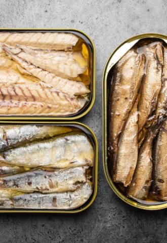 Photo shows three tins of fish. Tinned fish sold in UK supermarkets as "mackerel" may not actually contain any true mackerel