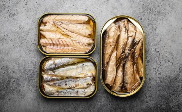 Photo shows three tins of fish. Tinned fish sold in UK supermarkets as "mackerel" may not actually contain any true mackerel