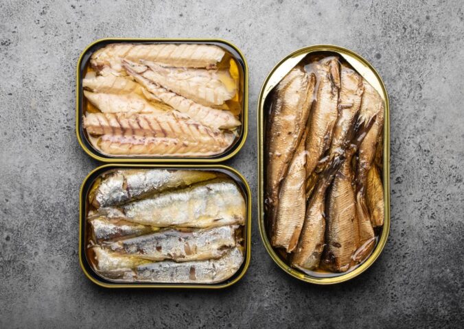 Photo shows three tins of fish. Tinned fish sold in UK supermarkets as "mackerel" may not actually contain any true mackerel