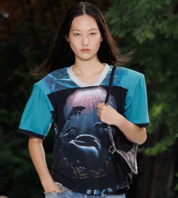 Photo shows a model wearing an ocean-inspired top on the runway at a recent fashion show by designer Stella McCartney, who said, “Sea life, not sea food."