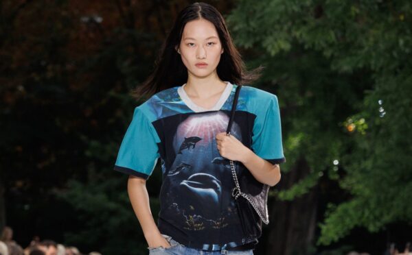 Photo shows a model wearing an ocean-inspired top on the runway at a recent fashion show by designer Stella McCartney, who said, “Sea life, not sea food."