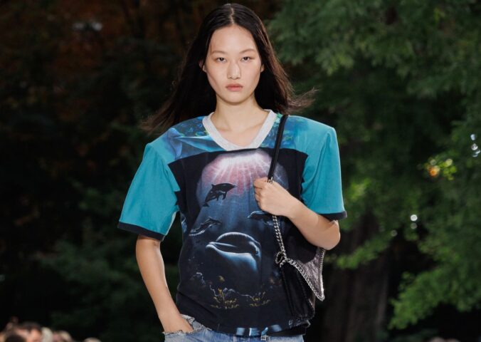 Photo shows a model wearing an ocean-inspired top on the runway at a recent fashion show by designer Stella McCartney, who said, “Sea life, not sea food."